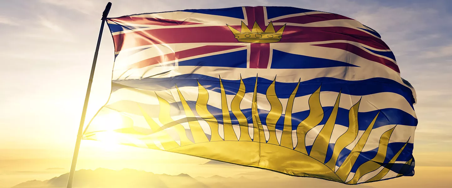 BC Flag with sunshine background